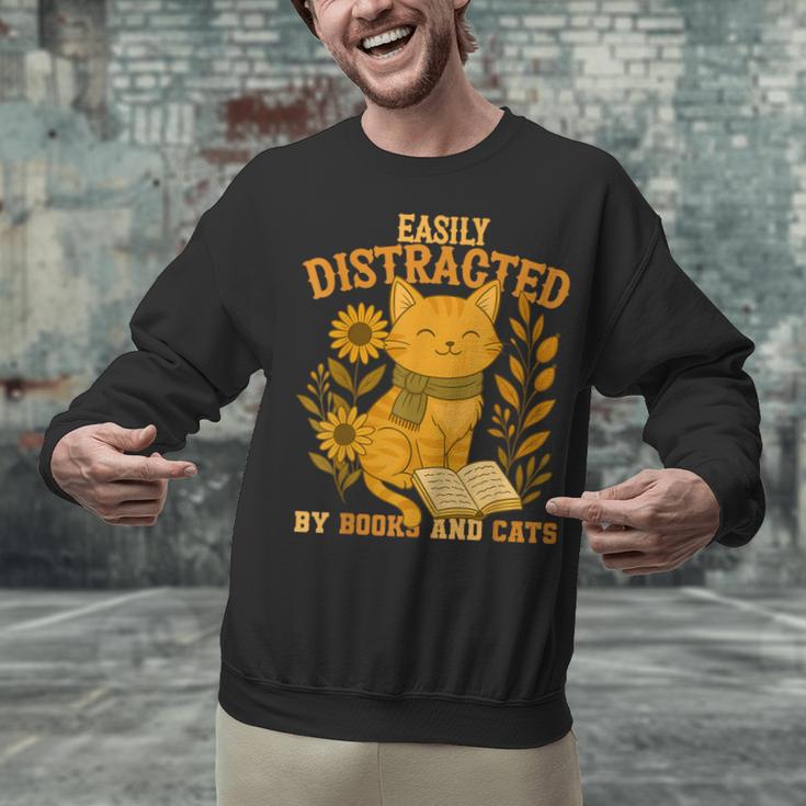 Easily Distracted By Cats And Books Cute Cat Book Lover Unisex Sweatshirt
