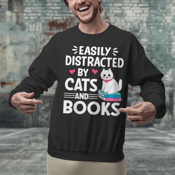 Easily Distracted By Cats And Books Cute Cat And Book Lovers Unisex Sweatshirt