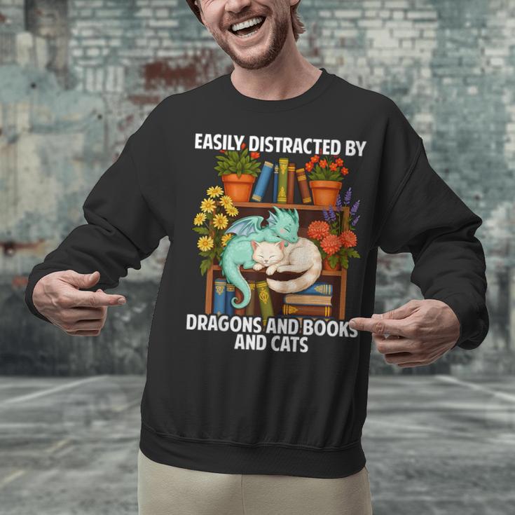Easily Distracted By Dragons Books Cats Fantasy Book Lover Unisex Sweatshirt Easily Distracted By Dragons Books Cats Fantasy Book Lover Unisex Sweatshirt