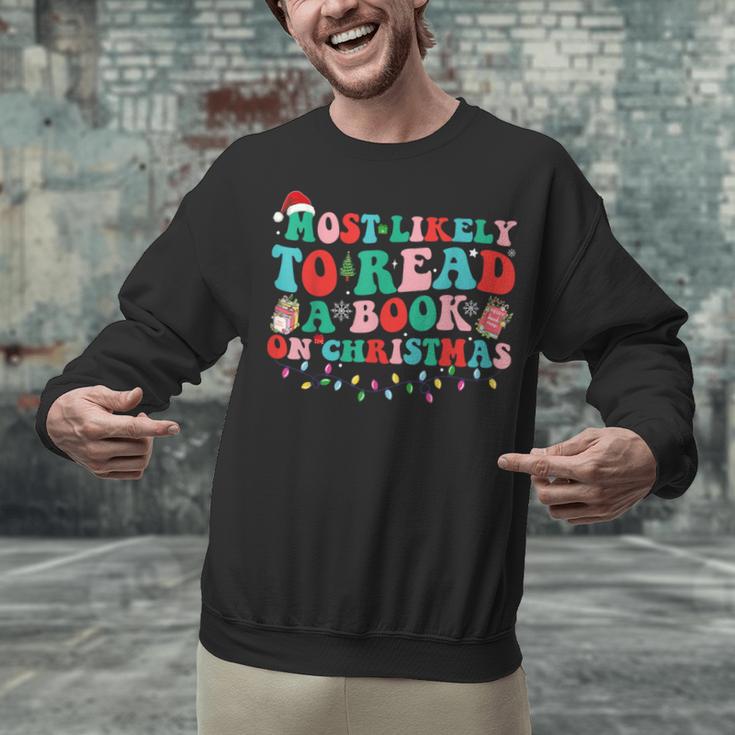 Groovy Christmas Most Likely To Read A Book On Christmas Unisex Sweatshirt