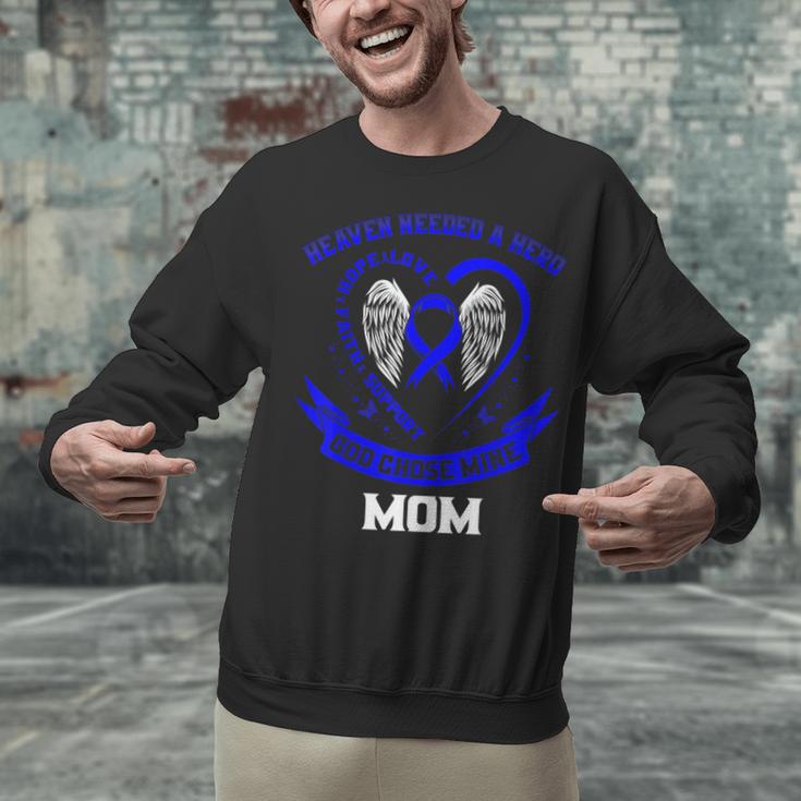 Heaven Need a Hero Colon Cancer Awareness In Memory Of Mom Unisex Sweatshirt Heaven Need a Hero Colon Cancer Awareness In Memory Of Mom Unisex Sweatshirt