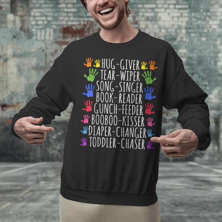 Hug Giver Book Reader Diaper Changer Daycare Teacher Unisex Sweatshirt Hug Giver Book Reader Diaper Changer Daycare Teacher Unisex Sweatshirt