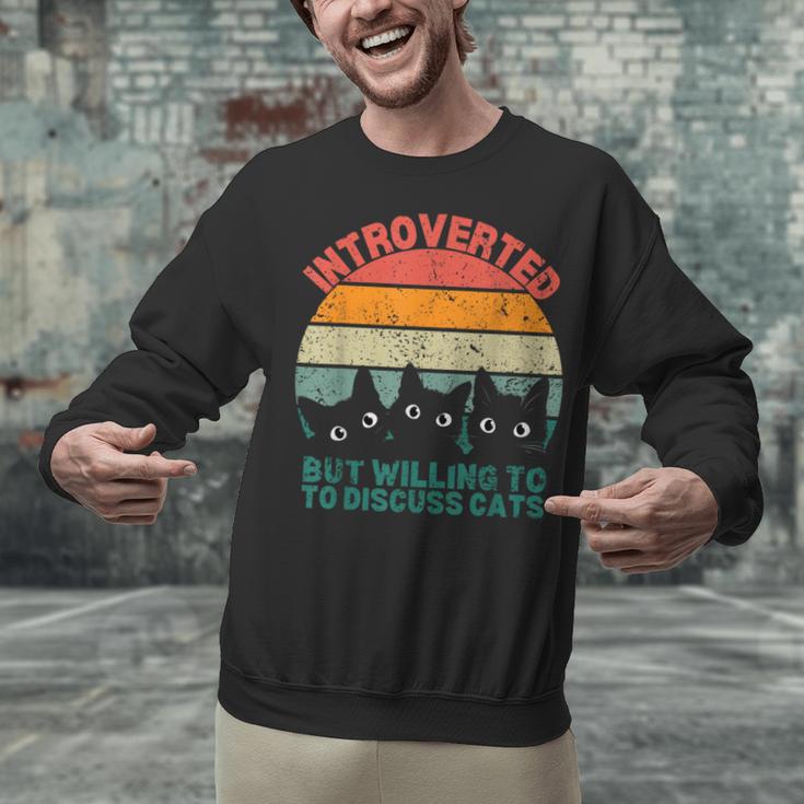 Introverted But Willing To Discuss Cats Unisex Sweatshirt Introverted But Willing To Discuss Cats Unisex Sweatshirt