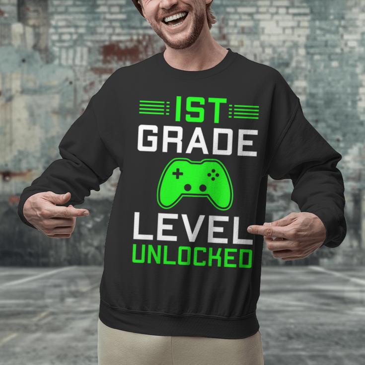 Kids 1st Grade Level Unlocked Back To School Gamer Graduation Unisex Sweatshirt