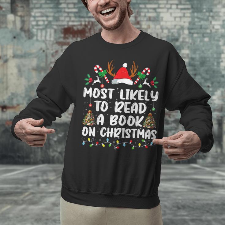Most Likely To Read A Book On Christmas Matching Family Unisex Sweatshirt