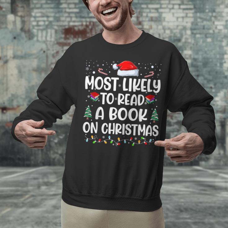 Most Likely To Read A Book On Christmas Matching Family Xmas Unisex Sweatshirt Most Likely To Read A Book On Christmas Matching Family Xmas Unisex Sweatshirt