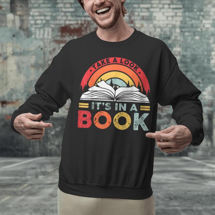 Take A Look It's In A Book Reading Book Vintage Rainbow Unisex Sweatshirt