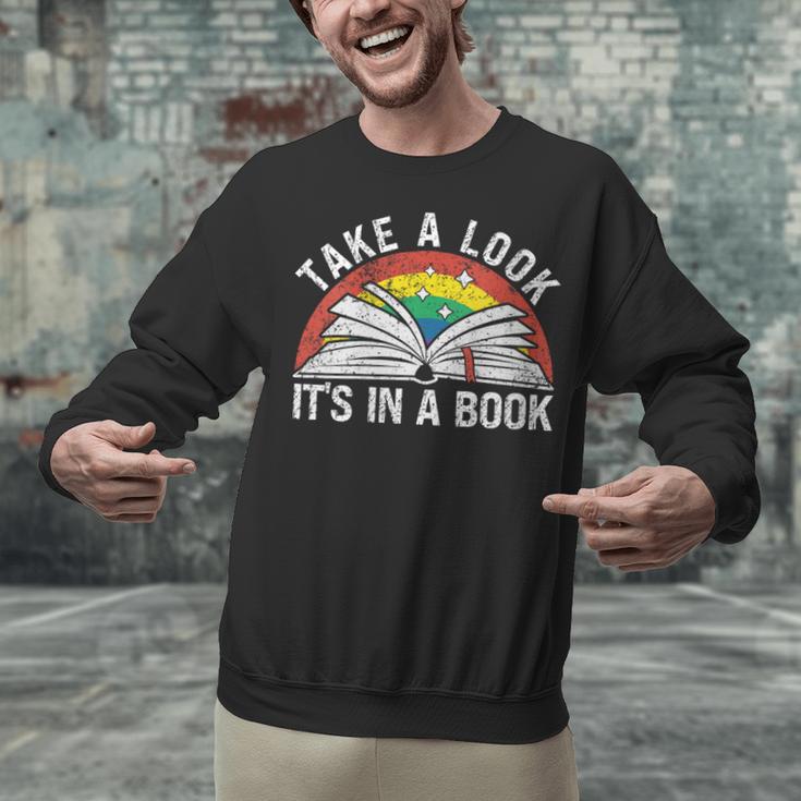 Take a Look It's In a Book Reading Vintage Retro Rainbow Unisex Sweatshirt