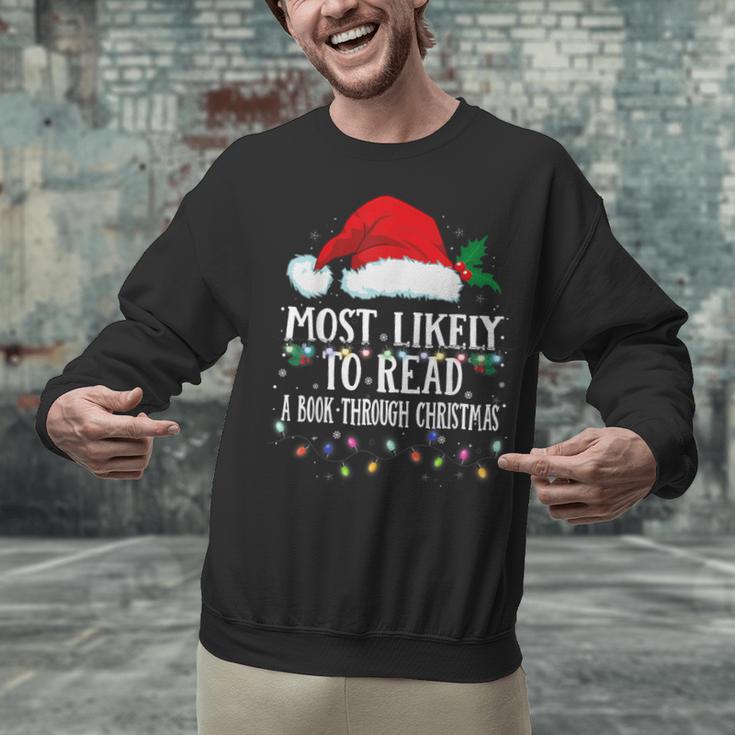 Matching Christmas PJS Most Likely To Read A Book Unisex Sweatshirt
