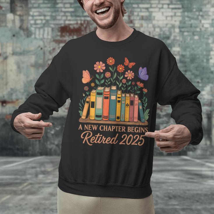 A New Chapter Begins Retired 2025 Books Flowers Unisex Sweatshirt