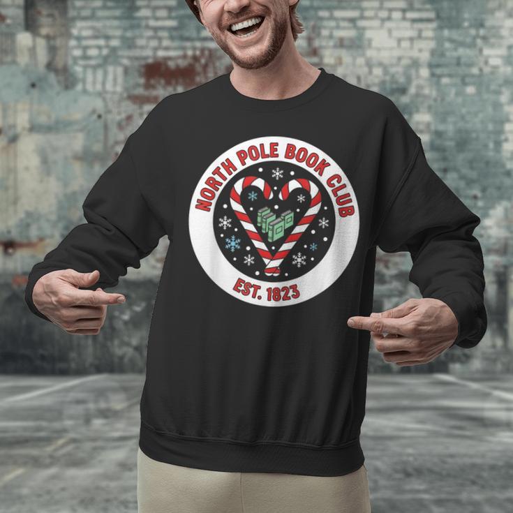 North Pole Book Club Shirt Candy Cane Christmas Unisex Sweatshirt