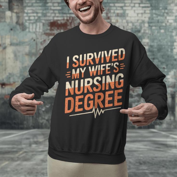 Nurse Graduation I Survived My Wife'S Nursing Degree Nurse Unisex Sweatshirt
