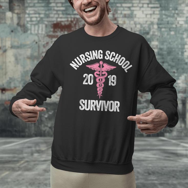 Nursing School Survivor Apparel Graduation Party Nurse RN Unisex Sweatshirt