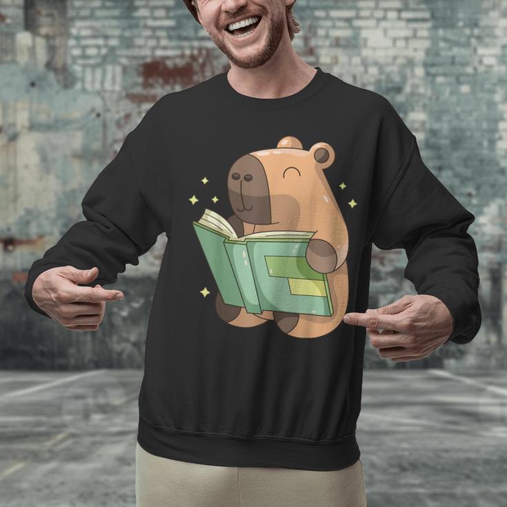 Pet Capybara Is Reading Library Capy Word Book Day Teacher Men Women Kids Unisex Sweatshirt