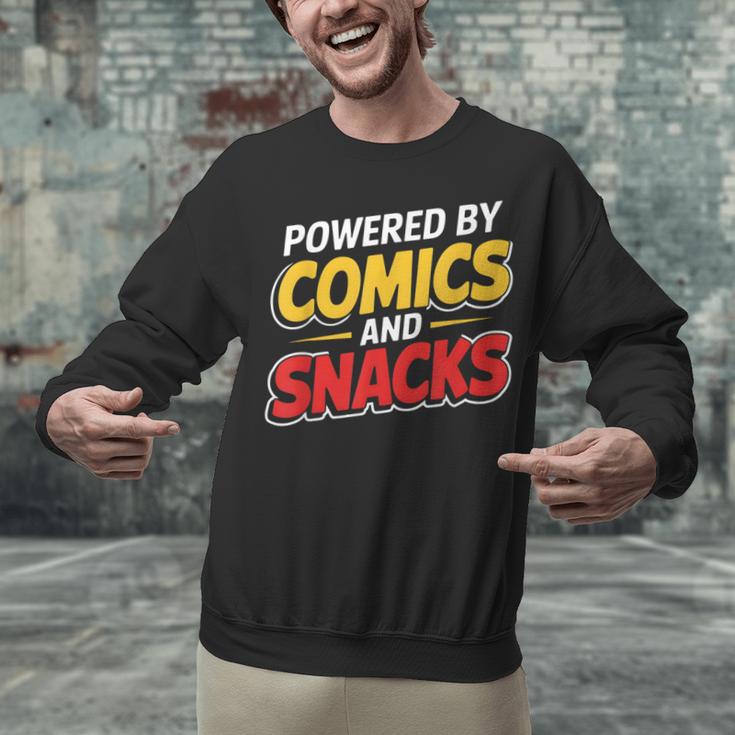 Powered By Comics And Snacks Comic Book Lover Unisex Sweatshirt
