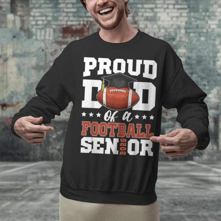 Proud Dad Of a Football Senior 2026 Graduation Unisex Sweatshirt