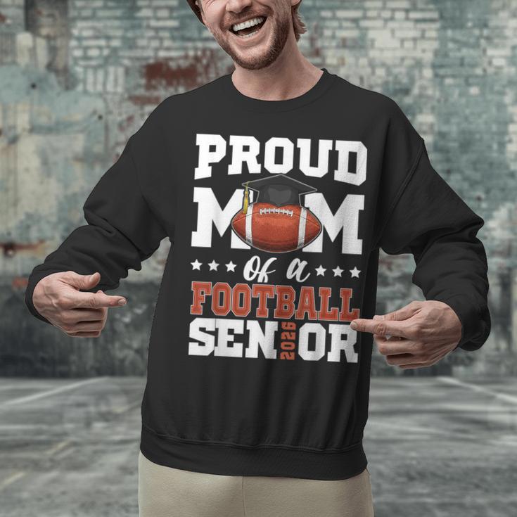 Proud Mom Of a Football Senior 2026 Graduation Gifts Unisex Sweatshirt