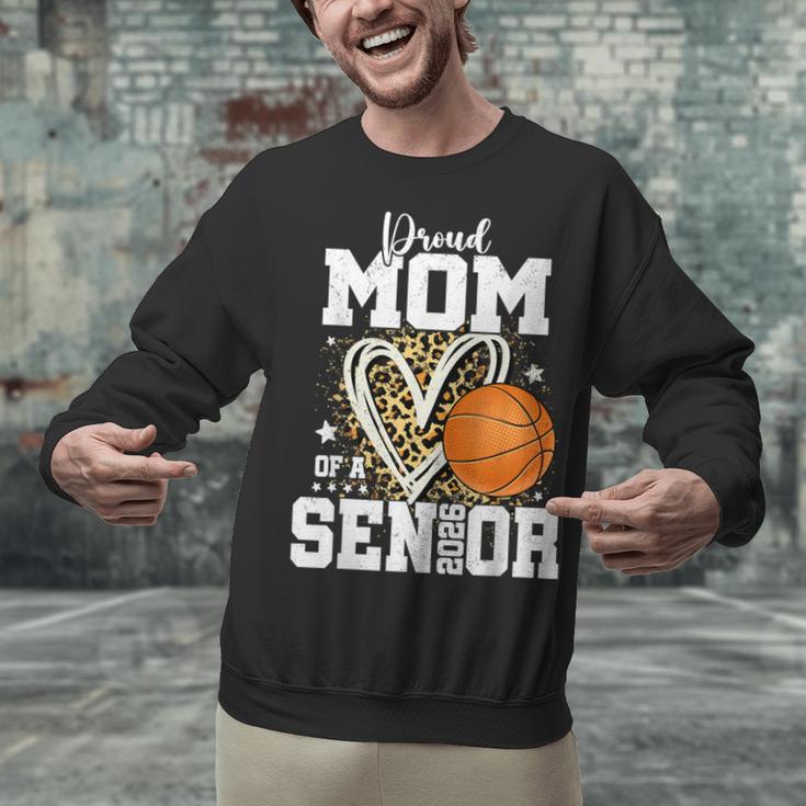 Proud Senior Mom Class Of 2026 Basketball Graduation Leopard Unisex Sweatshirt
