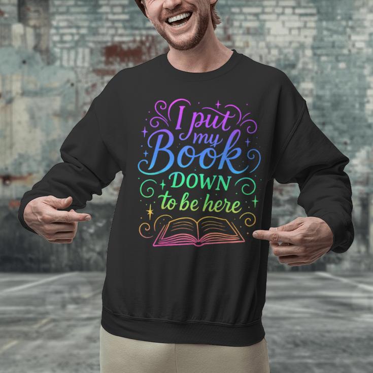 I Put My Book Down To Be Here Whimsical Graphic For Readers Unisex Sweatshirt