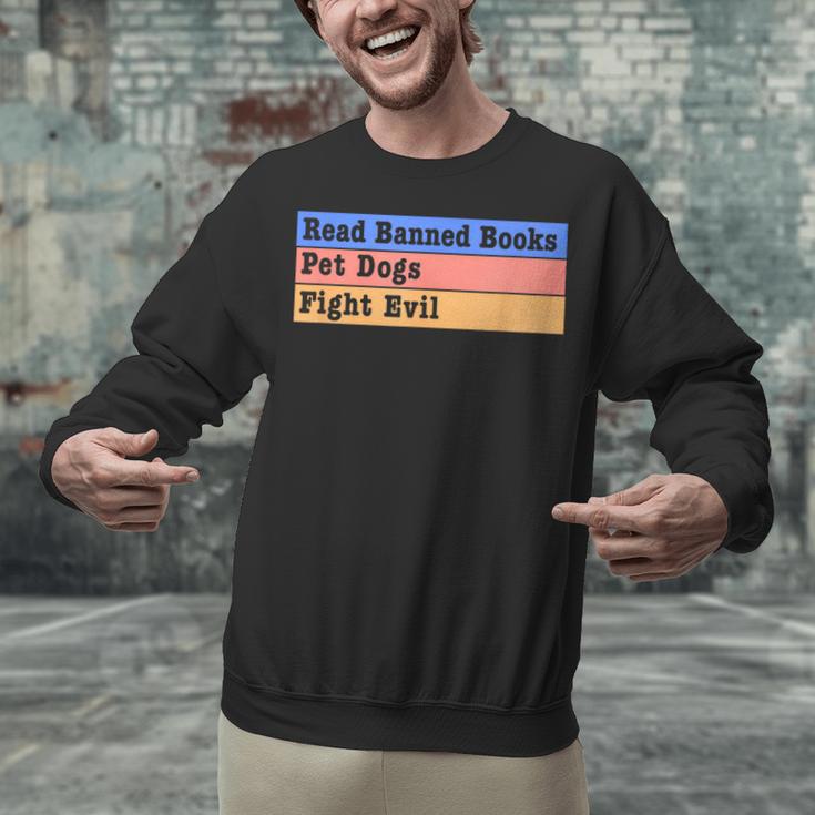 Read Banned Books Pet Dogs Fight Evil Unisex Sweatshirt Read Banned Books Pet Dogs Fight Evil Unisex Sweatshirt