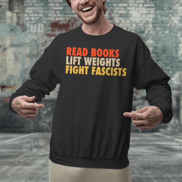 Read Books Lift Weights Fight Fascists Reading Humor Unisex Sweatshirt Read Books Lift Weights Fight Fascists Reading Humor Unisex Sweatshirt