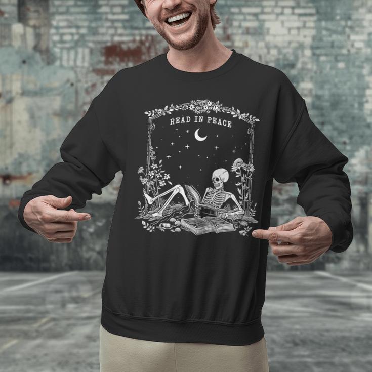 Read In Peace Skeleton Reading Book Halloween Bookish Unisex Sweatshirt