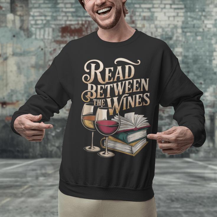 Read Between The Wines Vintage Book Lovers Wine Reading Unisex Sweatshirt Read Between The Wines Vintage Book Lovers Wine Reading Unisex Sweatshirt