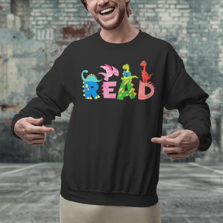 Reading DinosaurRex Dino Book Lover Unisex Sweatshirt
