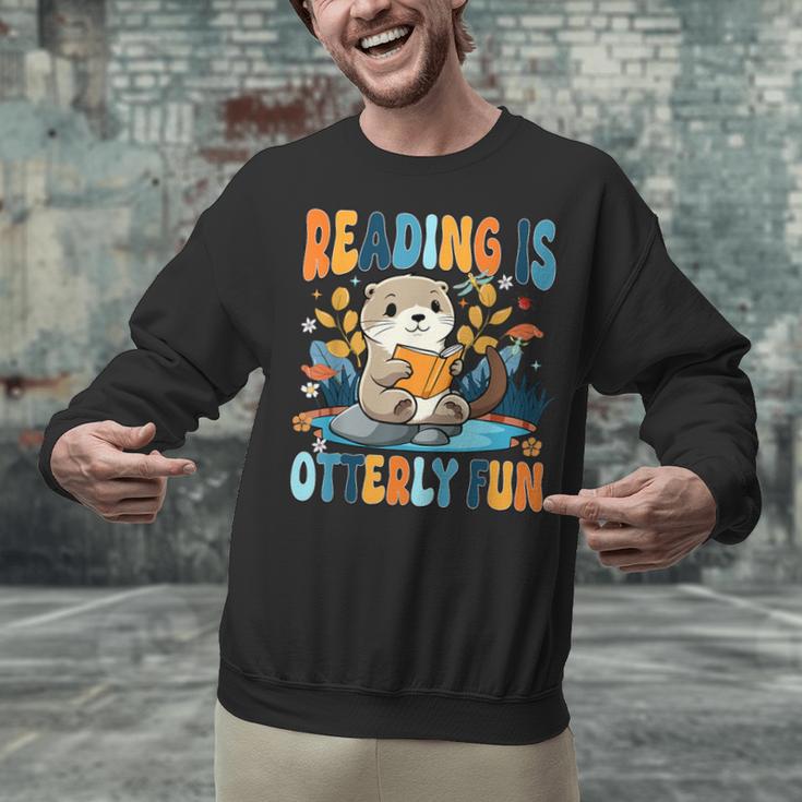 Reading Is Otterly Fun Sea Otter Book Lover Bookworm Unisex Sweatshirt