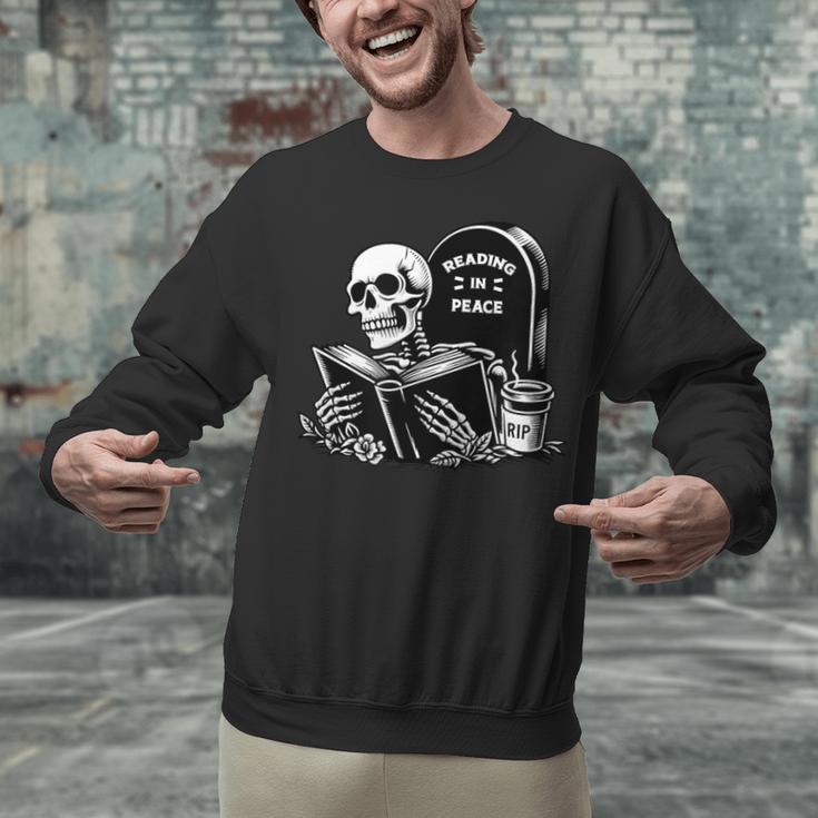 READING IN PEACE RIP Introvert Skeleton Read Book Meme Unisex Sweatshirt READING IN PEACE RIP Introvert Skeleton Read Book Meme Unisex Sweatshirt