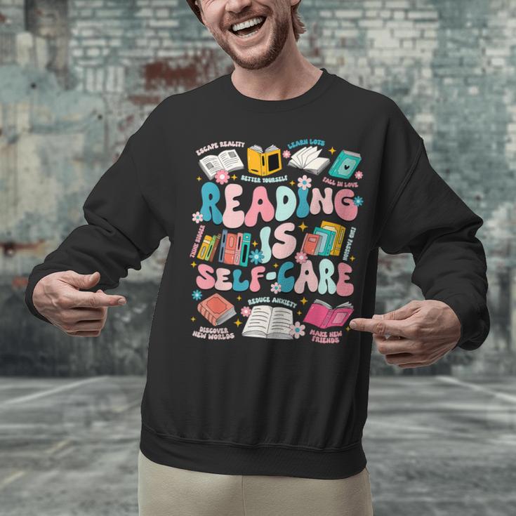 Reading Is Self-Care Book Lover Teacher Student Men Women Unisex Sweatshirt