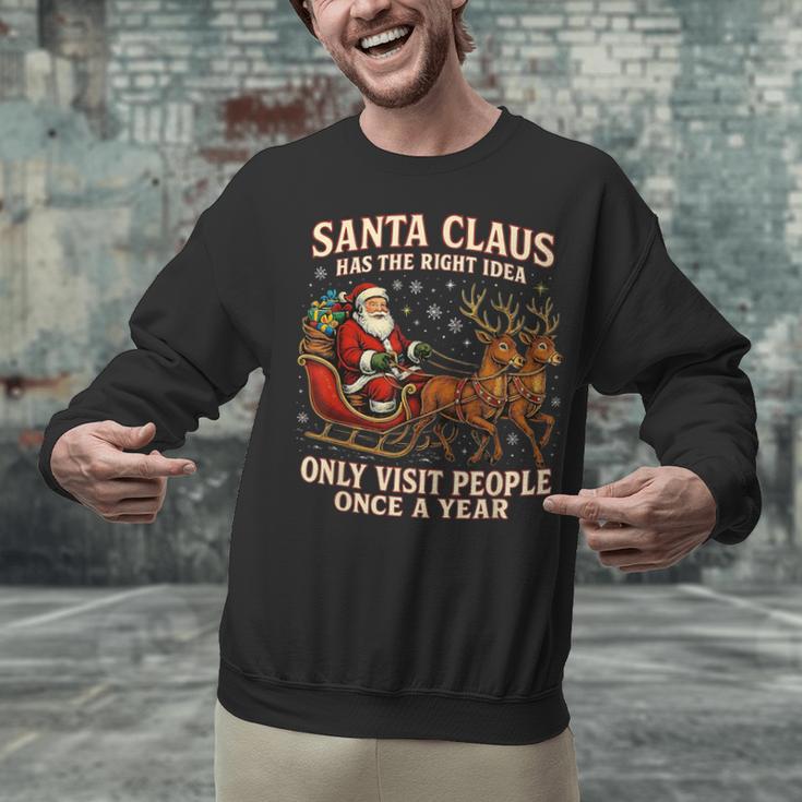 Santa Has The Right Idea Introvert Christmas Unisex Sweatshirt Santa Has The Right Idea Introvert Christmas Unisex Sweatshirt