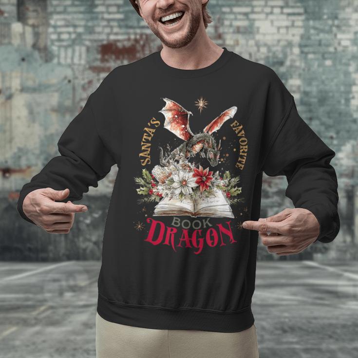Santa's Favorite Book Dragon Christmas Magic Unisex Sweatshirt