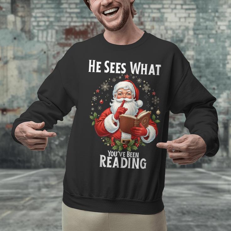 He Sees What You'Ve Been Reading Santa Book Lover For Women Unisex Sweatshirt He Sees What You'Ve Been Reading Santa Book Lover For Women Unisex Sweatshirt