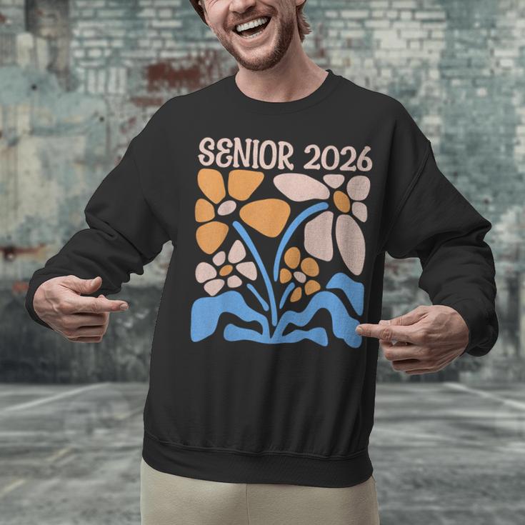 Senior 2026 Retro Groovy Flowers Graduation Unisex Sweatshirt