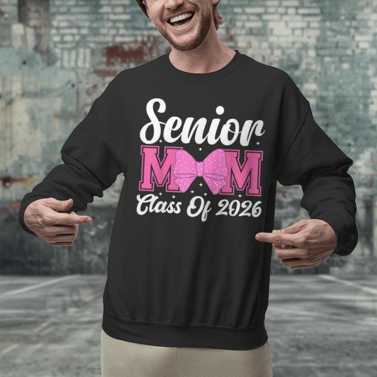 Senior Mom Class Of 2026 Pink Coquette Bow Graduation Unisex Sweatshirt