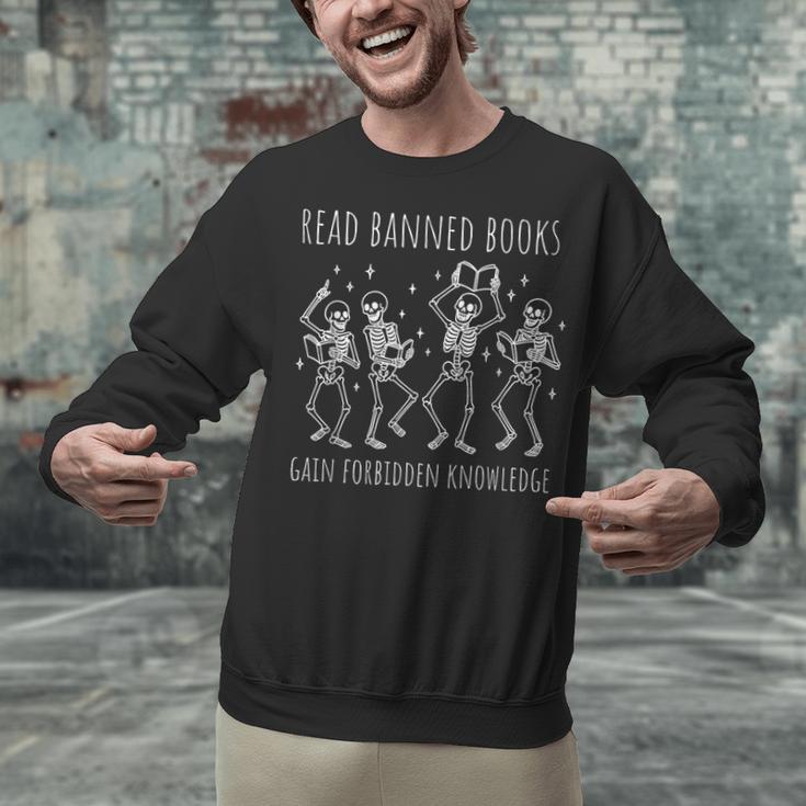 Skeleton Read Banned Books Gain Forbidden Knowledge Unisex Sweatshirt Skeleton Read Banned Books Gain Forbidden Knowledge Unisex Sweatshirt