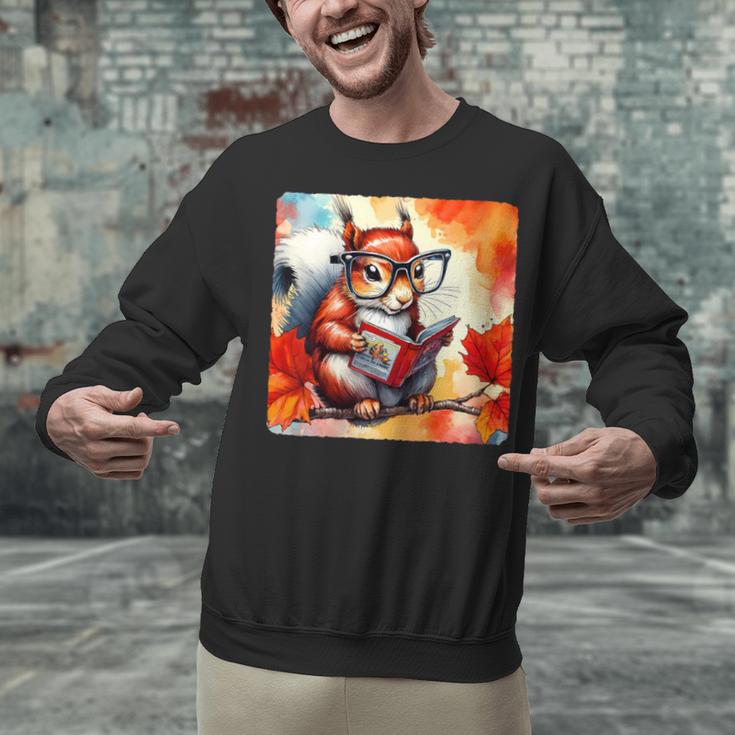 Squirrel Reading Comic Book On Autumn Branch Glasses Leaves Unisex Sweatshirt
