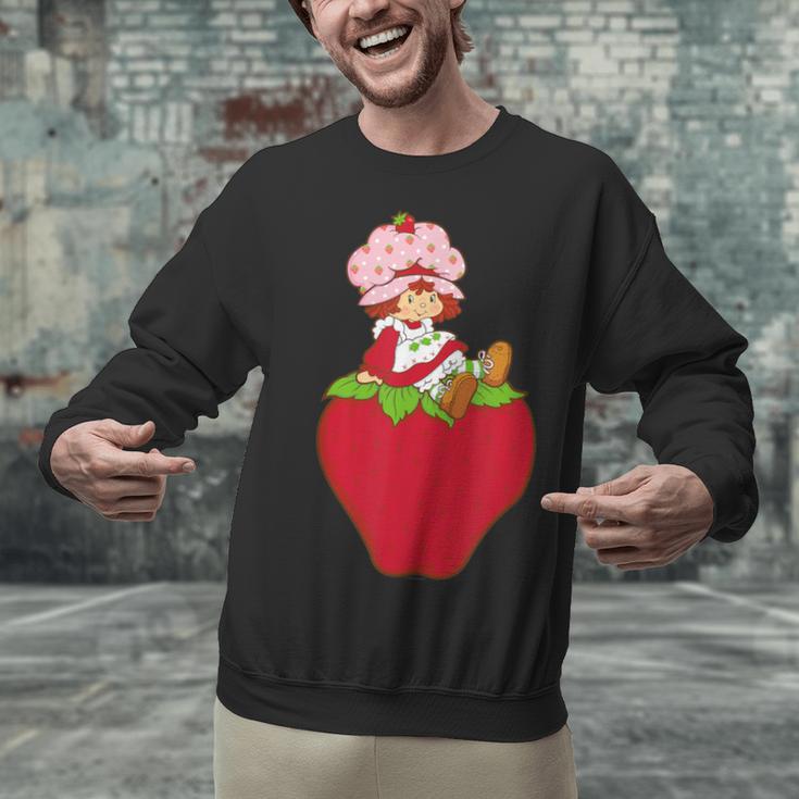 Strawberry Shortcake Sitting On Strawberry Retro Nostalgia Unisex Sweatshirt