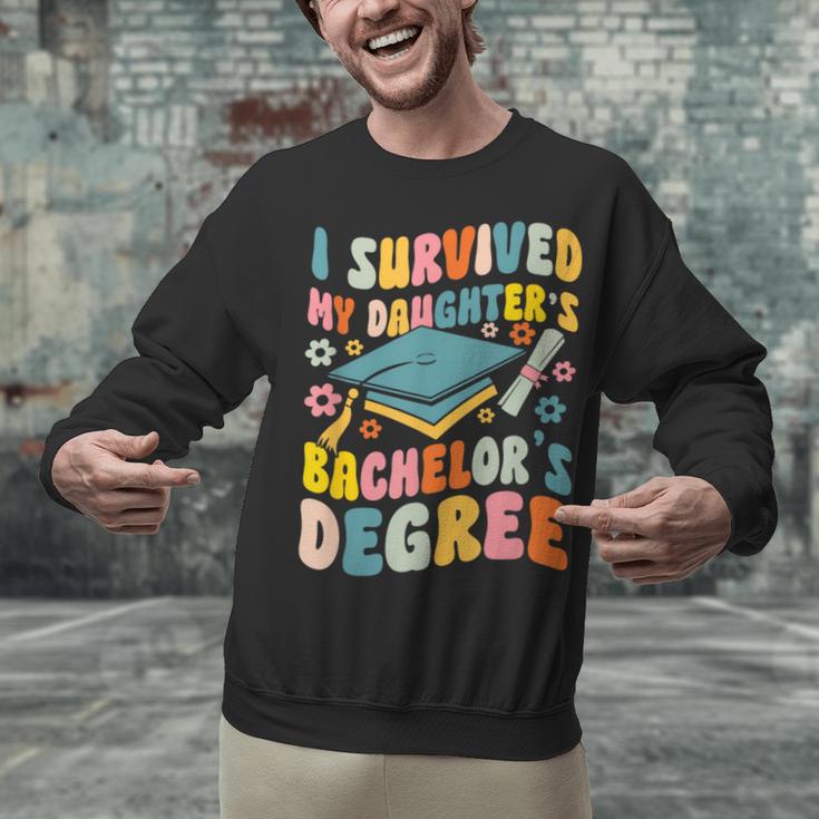 i Survived My Daughter's Bachelors Degree Groovy Graduation Unisex Sweatshirt