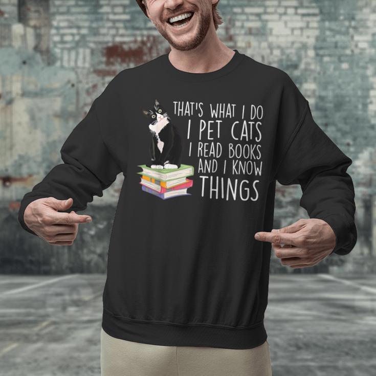 That's What I Do I Pet Cat I Read Books Tuxedo Cat Bookworm Unisex Sweatshirt