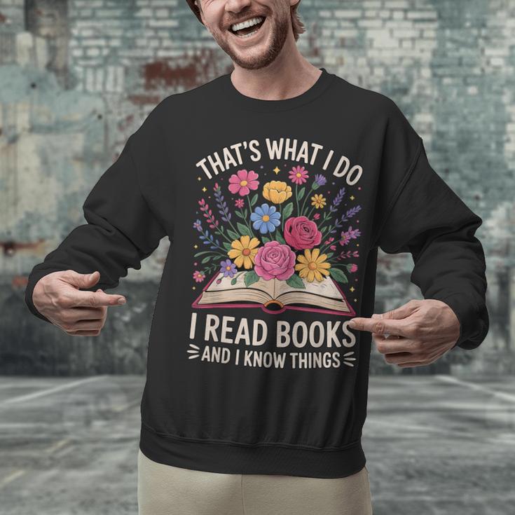 That’s What I Do I Read Books And I Know Things Floral Book Unisex Sweatshirt