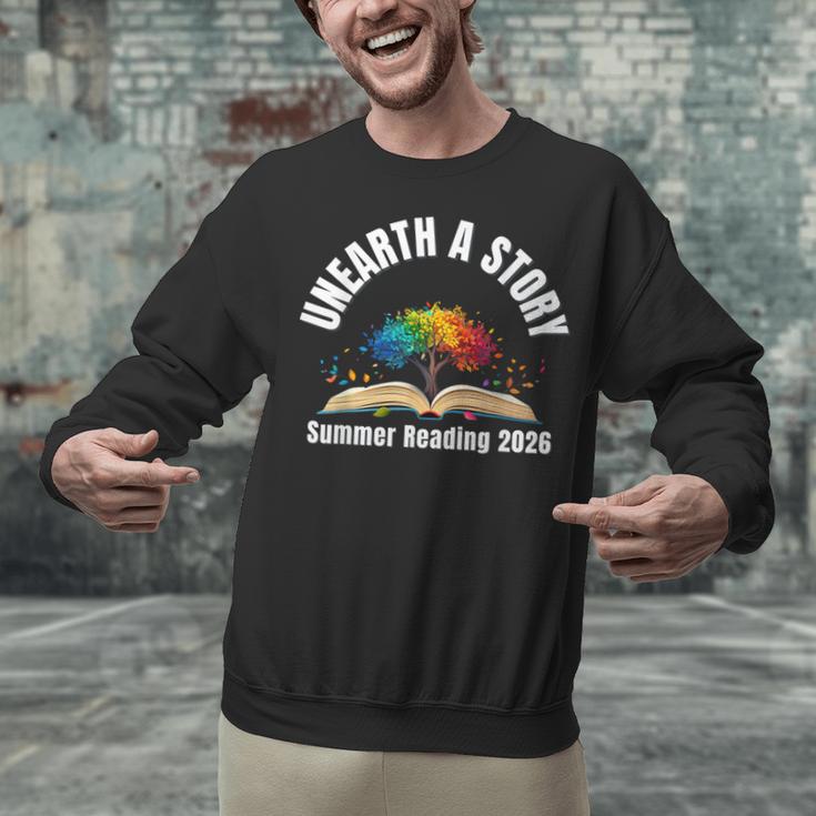 Unearth a Story 2026 Summer Reading Program Tree Book Unisex Sweatshirt