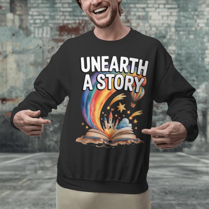 Unearth A Story Rainbow Treasure Book Unisex Sweatshirt