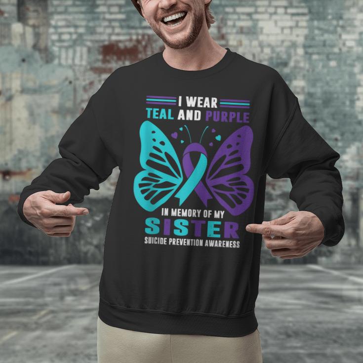 I Wear Teal And Purple In Memory Of My Sister Unisex Sweatshirt I Wear Teal And Purple In Memory Of My Sister Unisex Sweatshirt