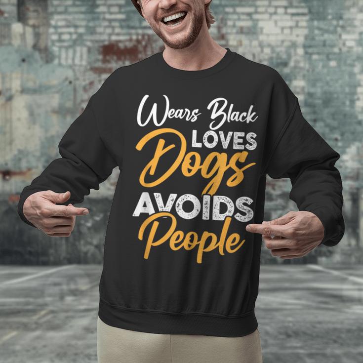 Wears Loves Dogs Avoids People I Introvert Unisex Sweatshirt