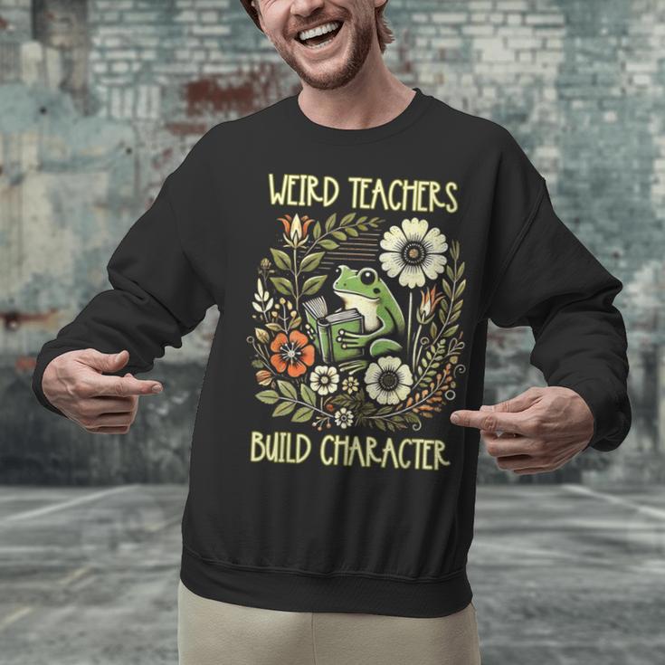 Weird Teachers Build Character Frog Reading Book Librarian Unisex Sweatshirt