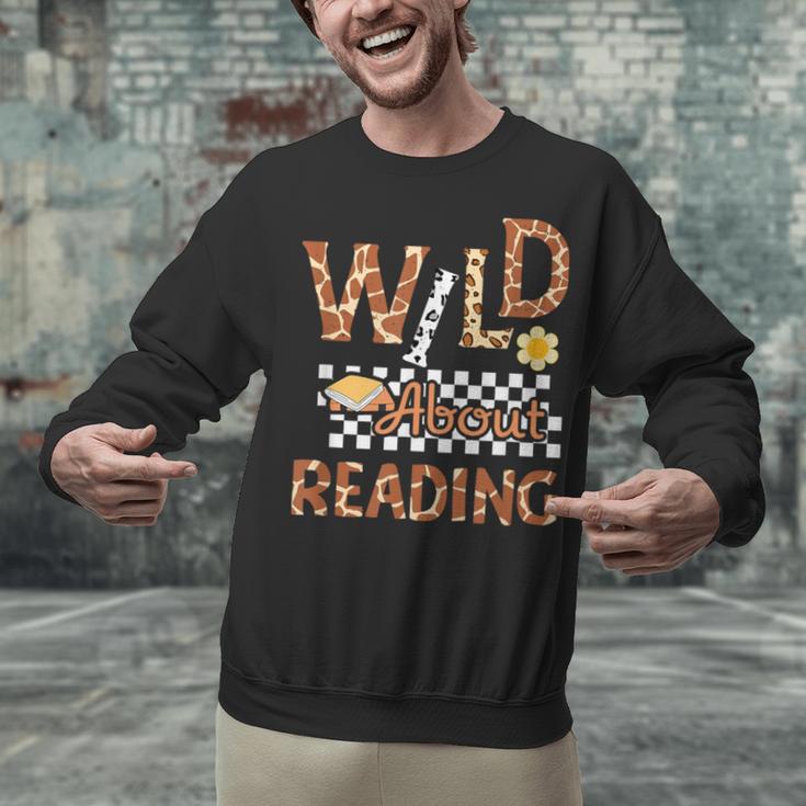 Wild About Reading Teacher Reading Books Back To School Unisex Sweatshirt