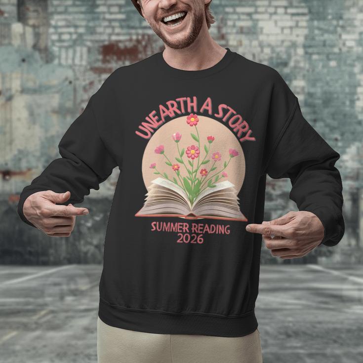 Women's Unearth a Story 2026 Summer Reading Program Flowers Book Unisex Sweatshirt Women's Unearth a Story 2026 Summer Reading Program Flowers Book Unisex Sweatshirt