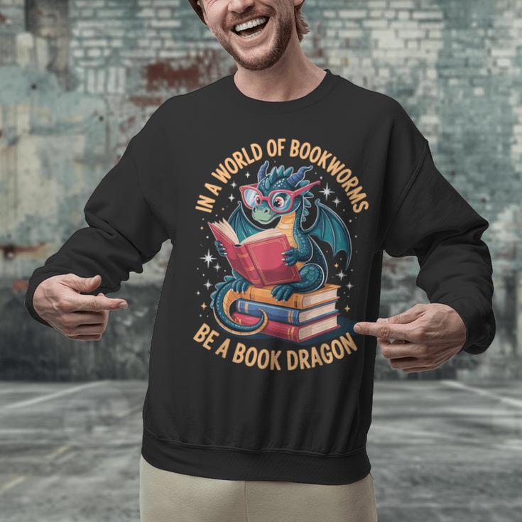 In A World Of Bookworms Be A Book Dragon Unisex Sweatshirt